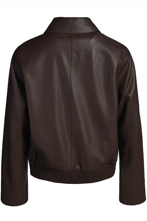 A genuine leather jacket in warm brown, showcasing natural grain, clean lines, and a timeless design perfect for everyday wear.
