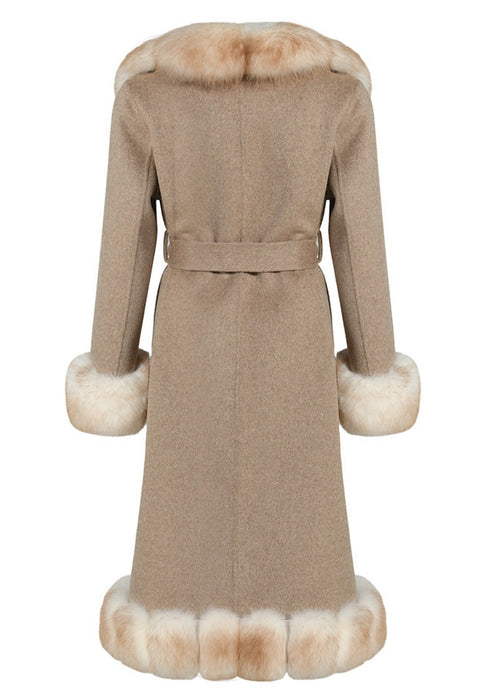 Designer Alcantara coat with fox fur details offering a refined look. Elegant beige coat crafted from soft Alcantara, featuring contrast fur elements that enhance its timeless design.